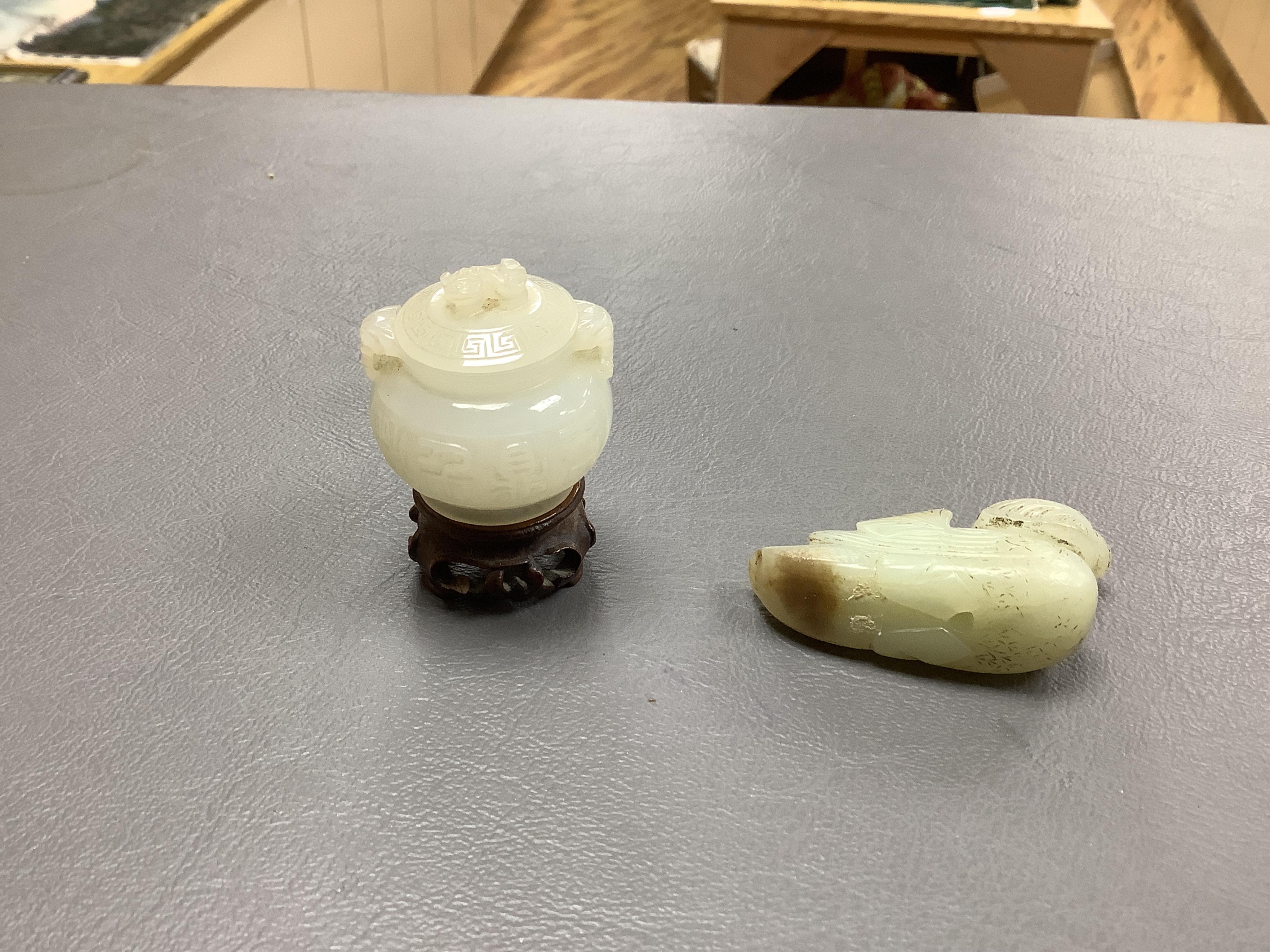 A Chinese jade figure of a Mandarin duck and a miniature pot and cover, three jadeite carvings and a bowenite dragon, 16.5cm
